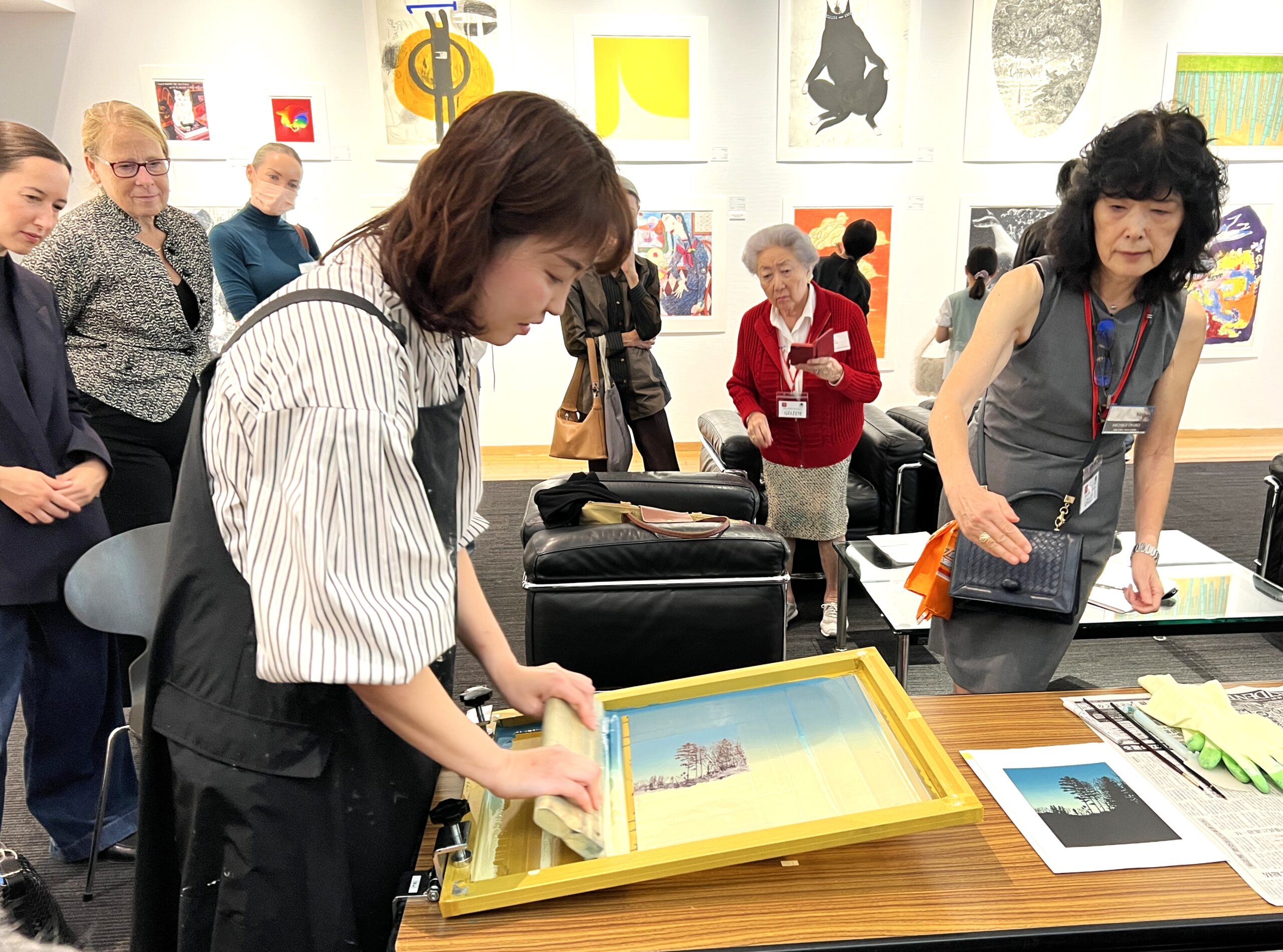 Hidemi Momma demonstrating printmaking at the 68th CWAJ Print Show